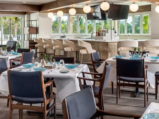 Bright dining room with modern decor and seating