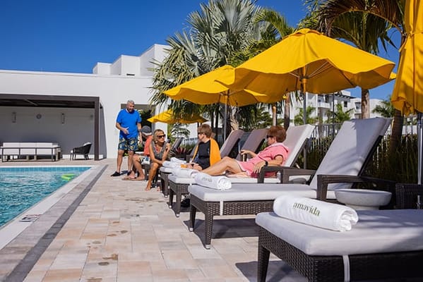 Residents enjoying time by the poolside