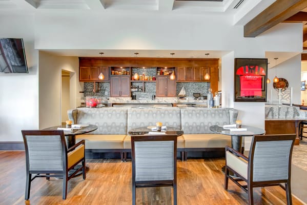 Interior view of a dining area with seating and decor