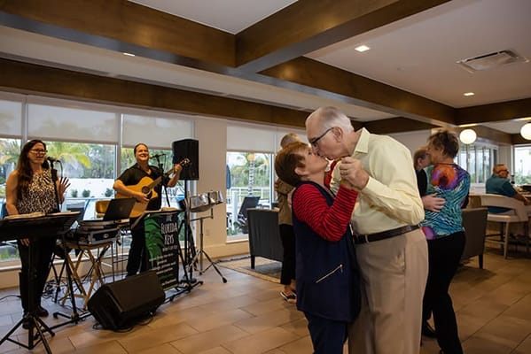 Residents enjoying a dance party in a common area