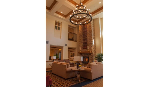 Cozy common area with seating and chandelier