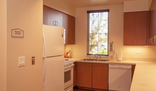 Interior view of a practice kitchen in the facility