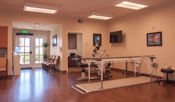 Interior view of a therapy room with equipment