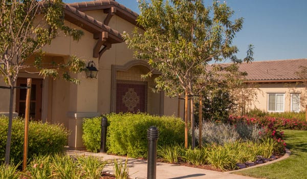Exterior view of a beautiful assisted living facility garden