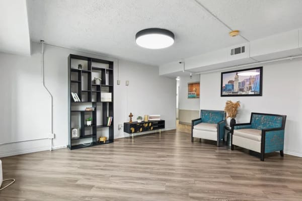 Bright common area with seating and decor