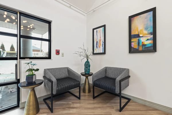 Modern interior seating area with art and plants