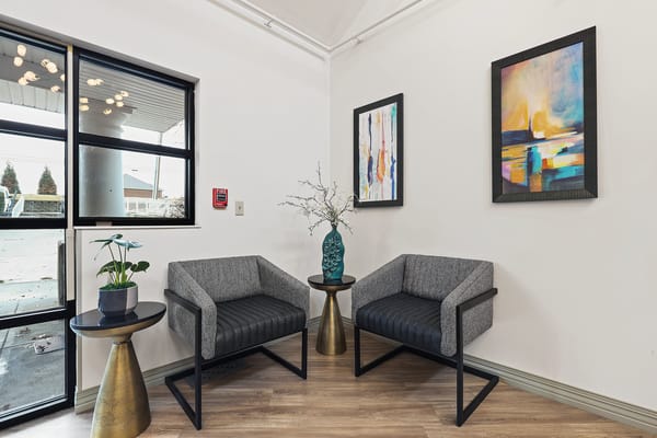 Modern interior seating area with art and plants