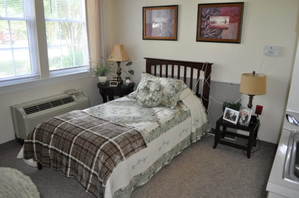 Cozy private bedroom in assisted living facility