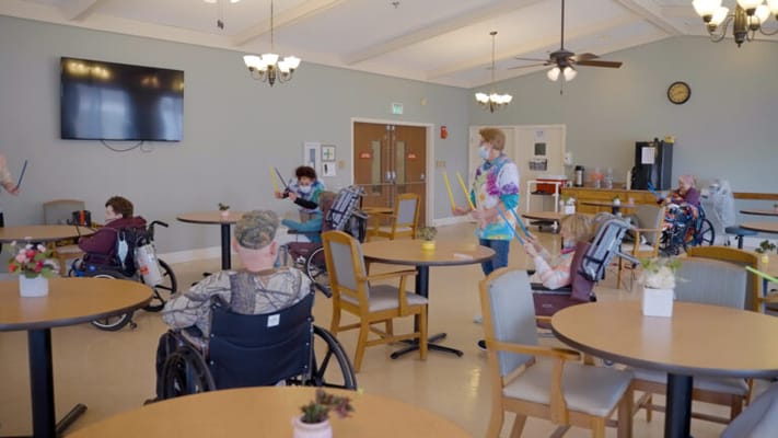 Residents participating in an activity in a common area