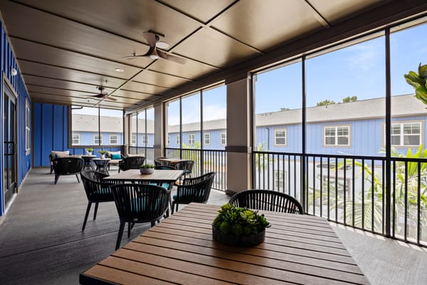 Outdoor seating area on a covered porch