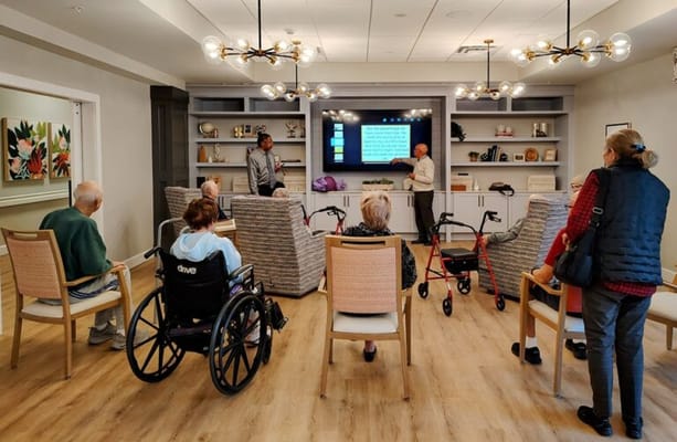 Residents participating in an activity session in a communal area