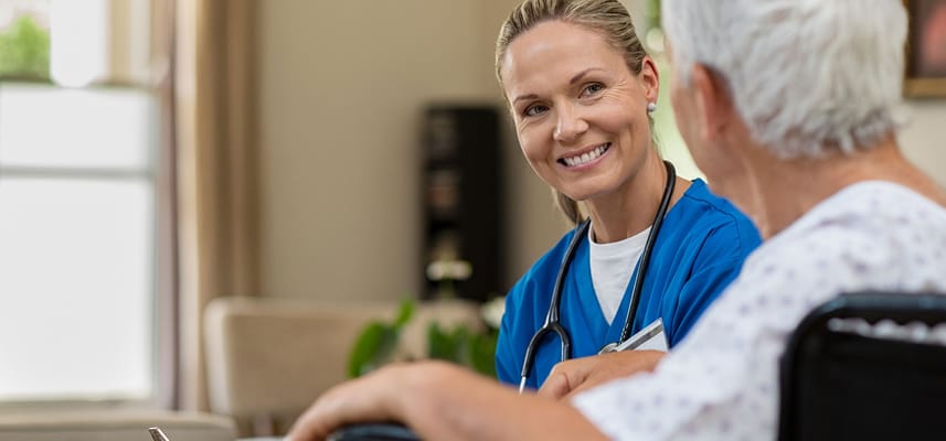 Healthcare professional interacting with a resident