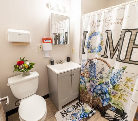 Well-decorated bathroom with floral accents
