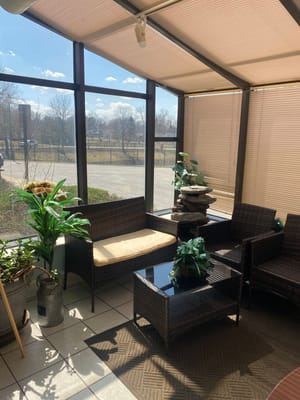 Bright common area with seating and plants