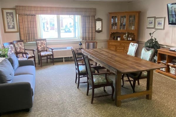 Cozy common area with seating and dining table