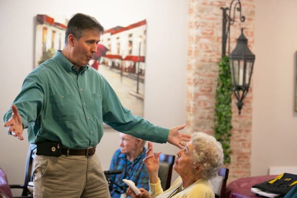 Staff engaging with residents in a common area