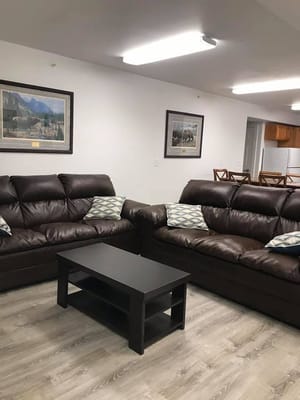 Common area featuring seating and artwork