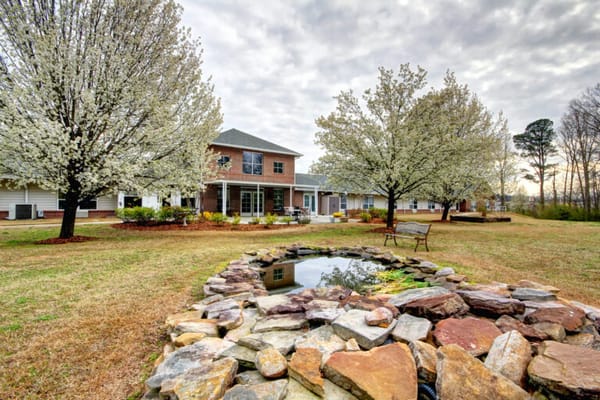 Outdoor view of Branchwater Village with blooming trees