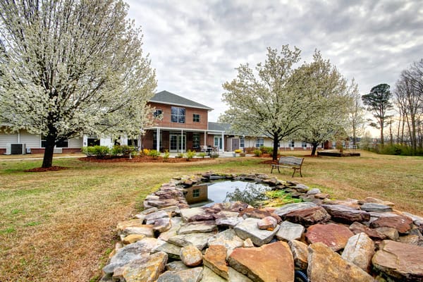 Outdoor view of Branchwater Village with blooming trees