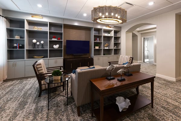 Bright common area with comfortable seating and decor