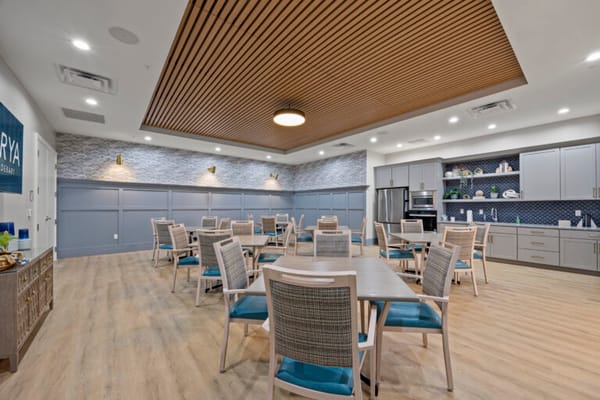 Bright and modern dining room with tables and chairs