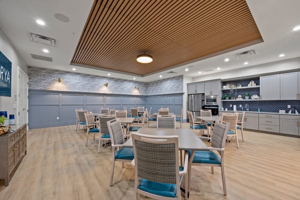 Bright and modern dining room with tables and chairs