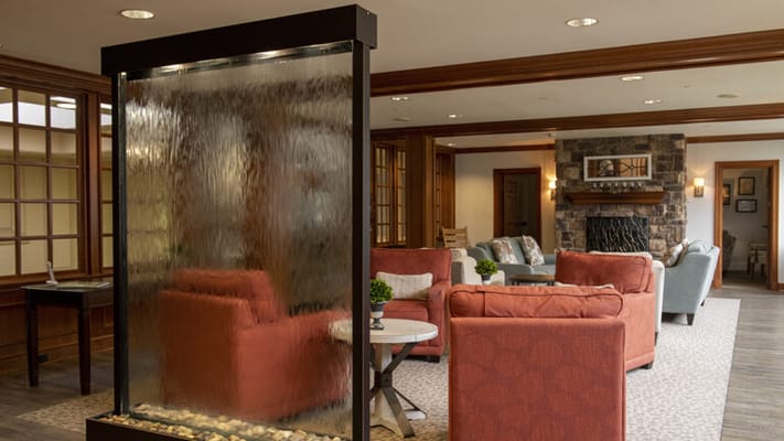 Cozy common area featuring a water fountain and seating