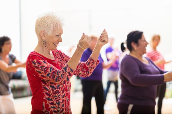 Residents participating in a group exercise class