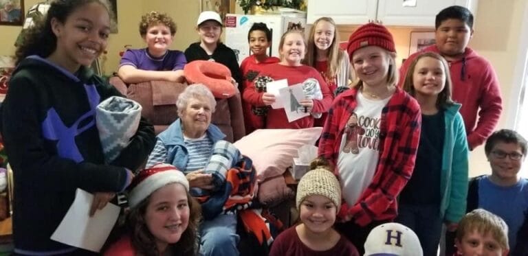 Residents and children during a festive activity