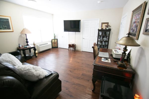 Cozy common area with seating and a television