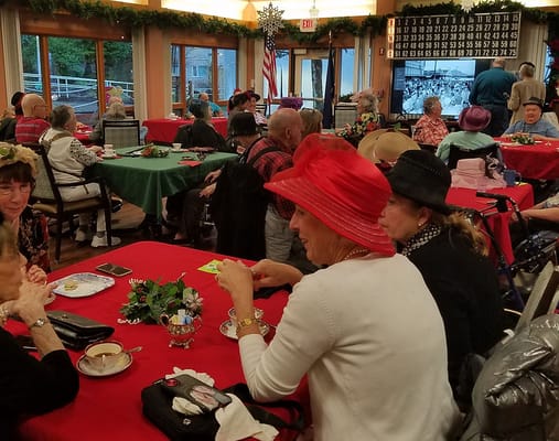 Residents enjoying a festive gathering in the activity room