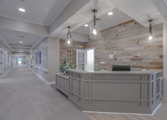 Lobby area with reception desk and seating