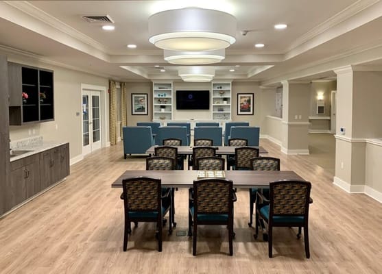 Interior view of a common area with tables and chairs