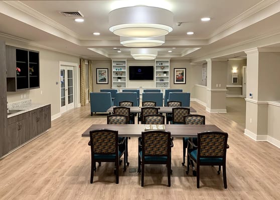 Interior view of a common area with tables and chairs