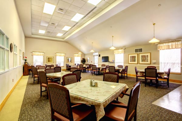 Interior dining area with tables and chairs