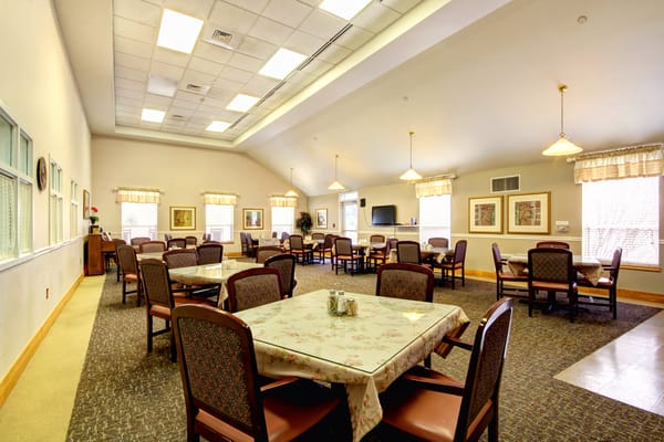 Interior dining area with tables and chairs