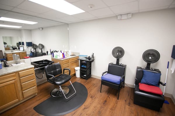 Interior view of a hair salon in the facility