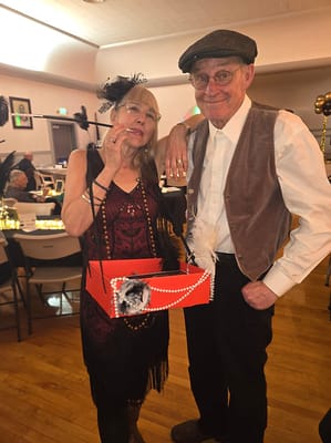 Residents enjoying a themed event in the activity room