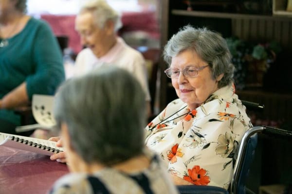 Residents engaging in a group activity indoors