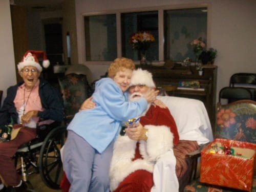 Residents celebrating with Santa Claus during the holidays