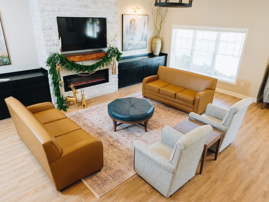 Cozy common area with seating and fireplace