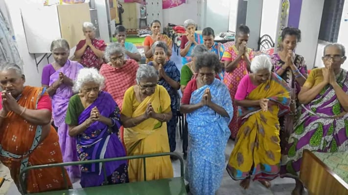 Residents participating in a prayer gathering