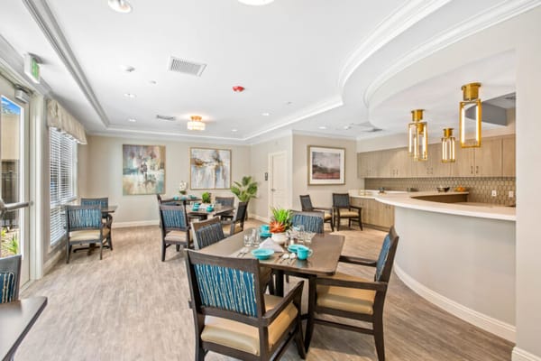 Bright dining area with modern decor and seating
