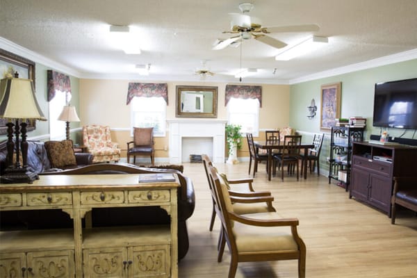 Common area with seating and a fireplace