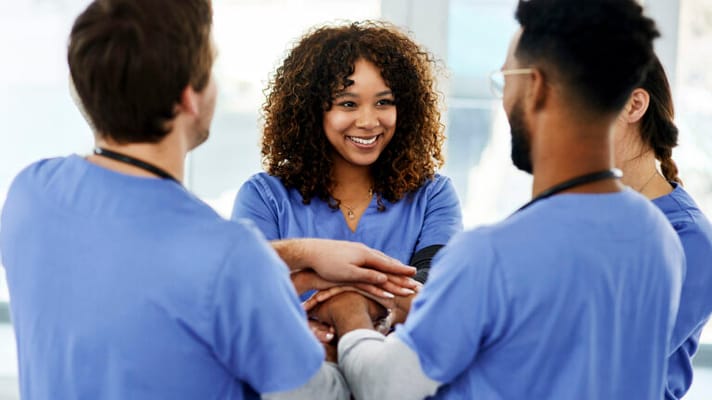 Healthcare professionals collaborating in a bright room