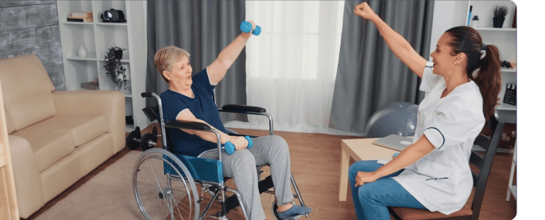 Resident exercising with a staff member in a common area