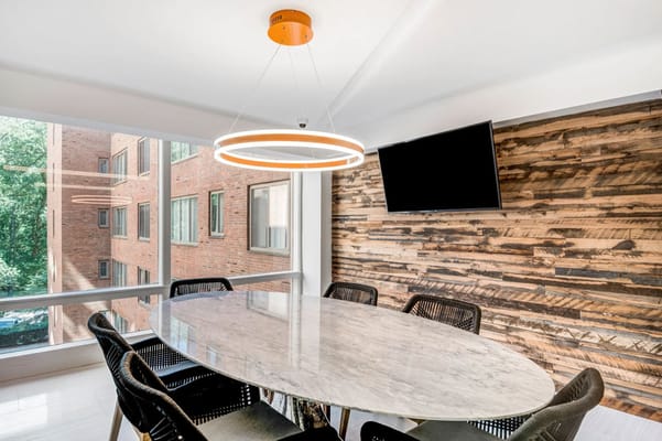 Modern common area with a large circular table