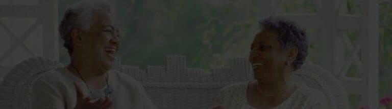 Two residents enjoying a lighthearted conversation