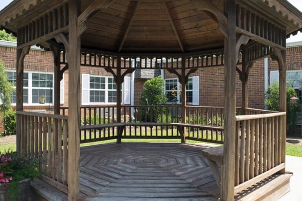 Wooden gazebo in outdoor space