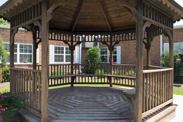 Wooden gazebo in outdoor space